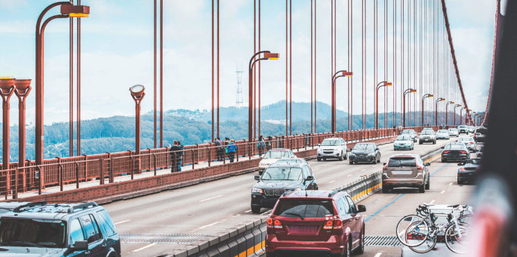 Traffic: a Lot of Cars Driving Across The Golden Gate Bridge